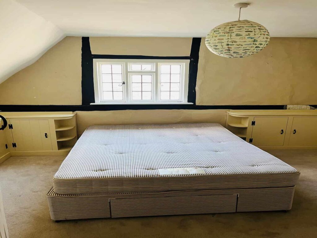 Professional 4 bedroom house removal in Newbury Berkshire carefully moving large bedroom furniture during a family home relocation